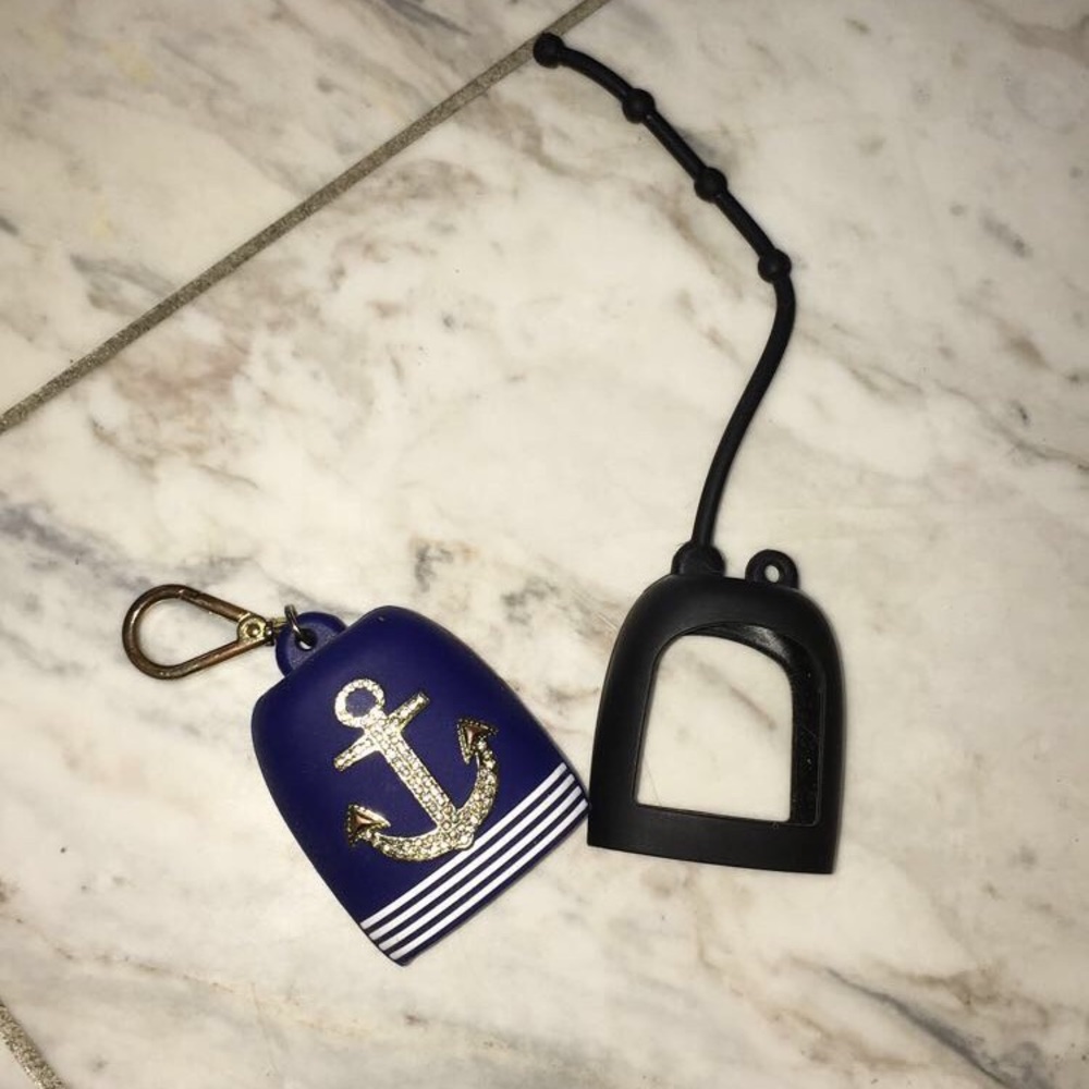 Two bath and body works hand sanitizer holders